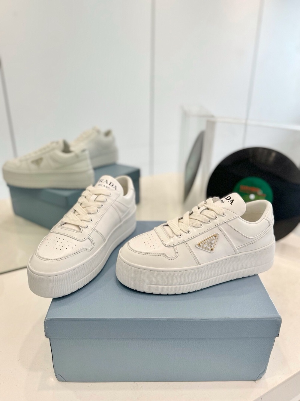 White Leather Platform Lace-Up Sneakers with Gold Triangle Accent